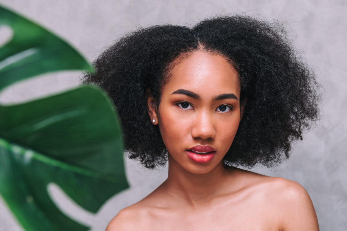 Portrait beautiful black african american woman with afro hair posing in beauty and skin care, smiling face ,positive emotion,Isolated Background.